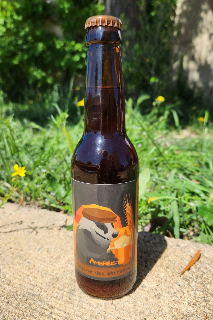 Bouteille de bière ambrée Root Moute